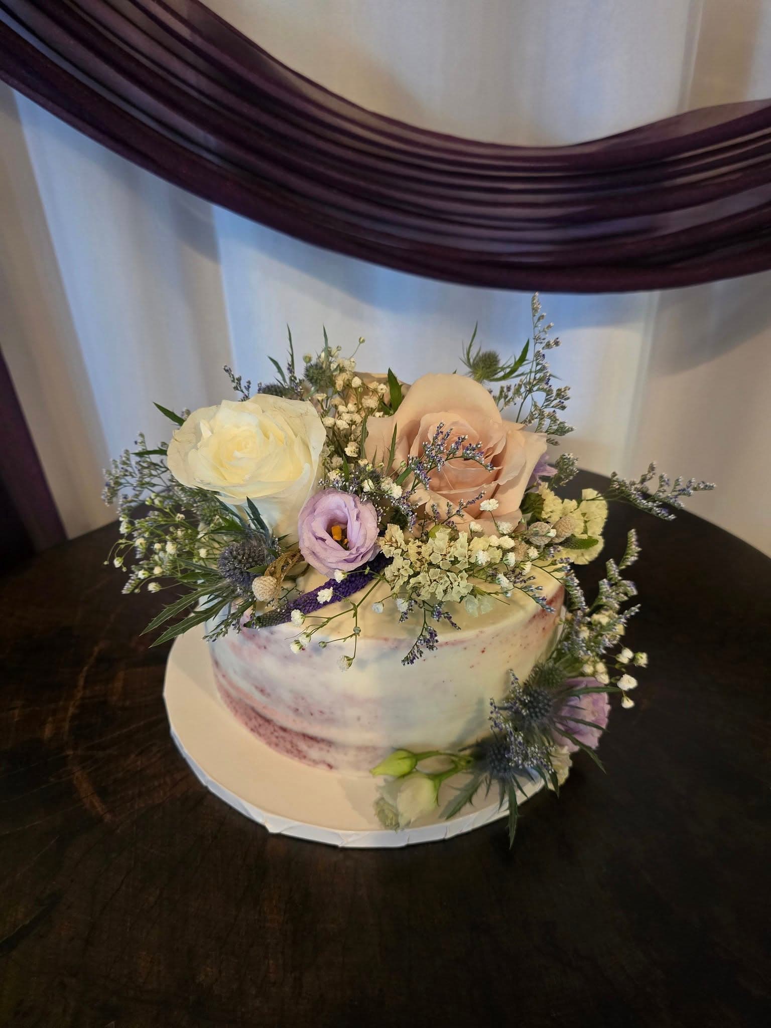 Tiered wedding cake with elegant floral accents